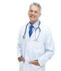 Portrait of friendly doctor smiling isolated against white background